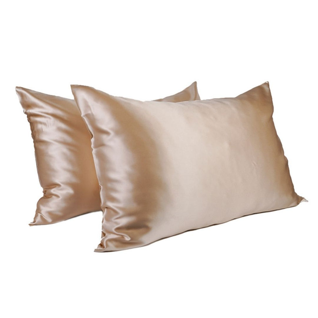 Two Soreia Queen Silk Pillowcases in 22 Momme mulberry silk, showcasing smooth, shiny fabric with elegant stitching.