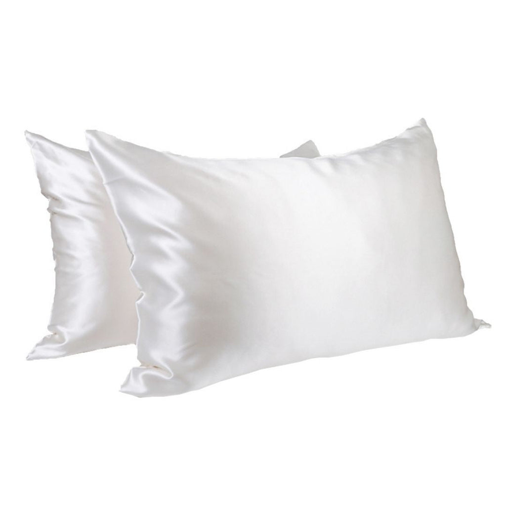Two Soreia Queen Silk Pillowcases in 22 Momme Mulberry silk, showcasing smooth, shiny fabric and elegant design.