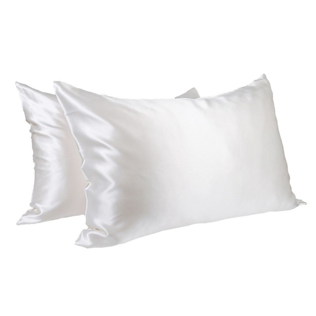 Two Soreia Queen Silk Pillowcases in 22 Momme Mulberry silk, showcasing smooth, shiny fabric and elegant design.