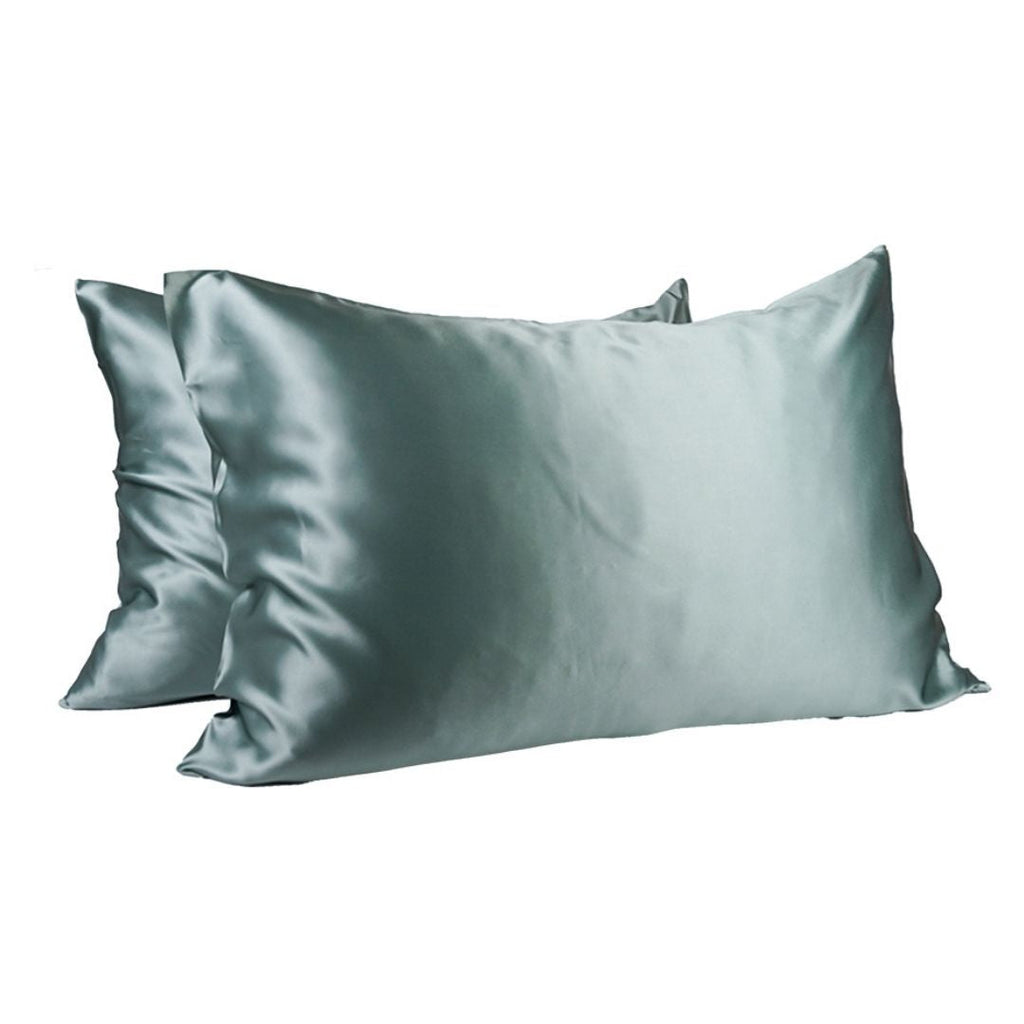 Two Soreia Queen Silk Pillowcases in 22 Momme Mulberry silk, showcasing smooth, shiny, and luxurious fabric with subtle stitching.