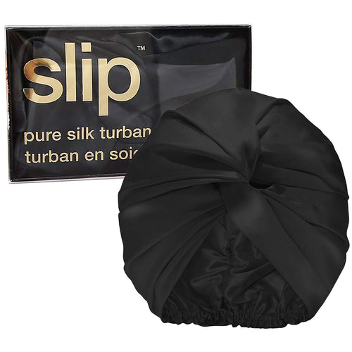Black gathered hair turban with a twisted front, shown beside a black box with gold slip branding.
