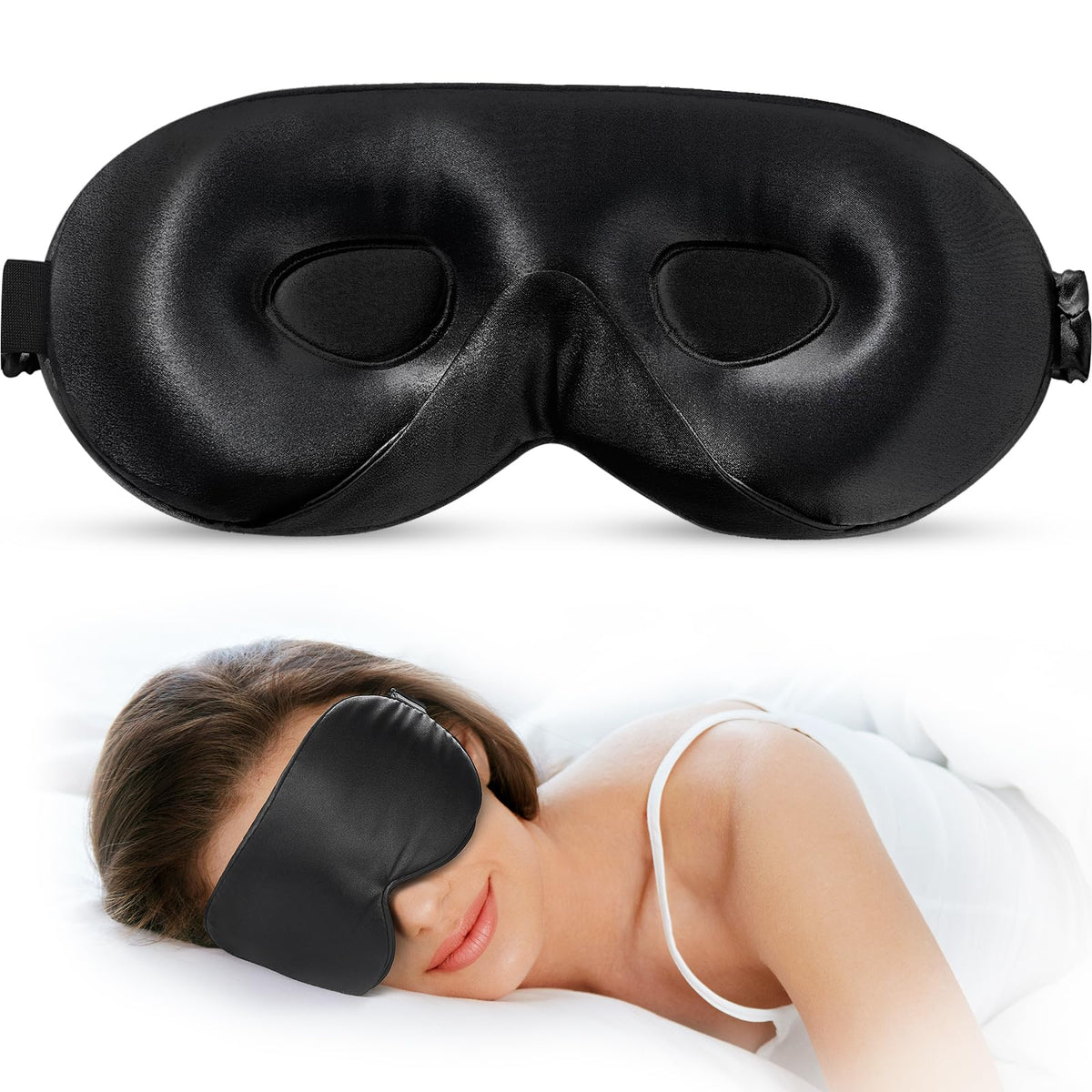 Black contoured sleep mask with recessed eye cups and a shaped nose area, shown above a person wearing it while lying on their side.