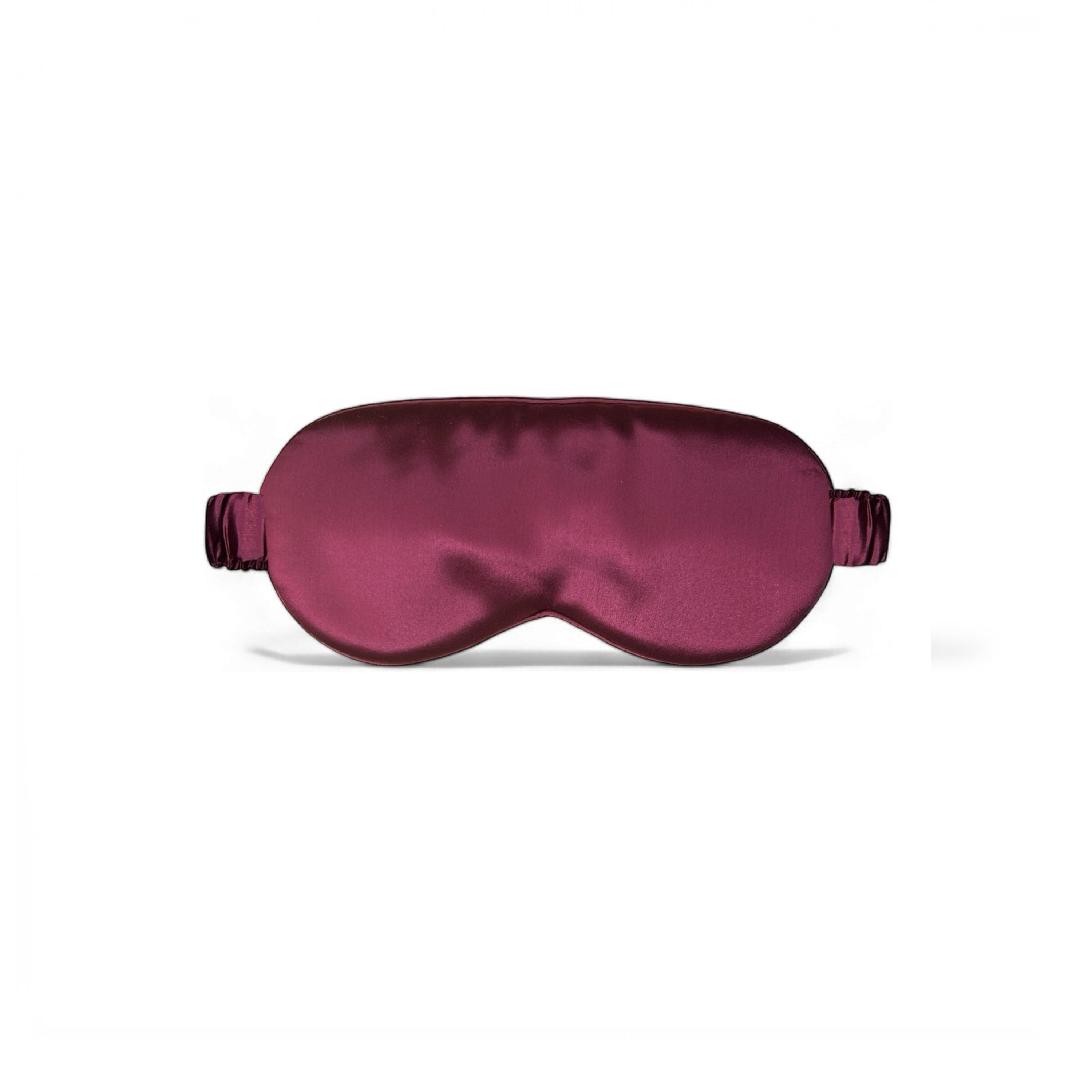 Soreia organic burgundy silk sleep mask with blackout design and 22 Momme, soft and luxurious for restful sleep.