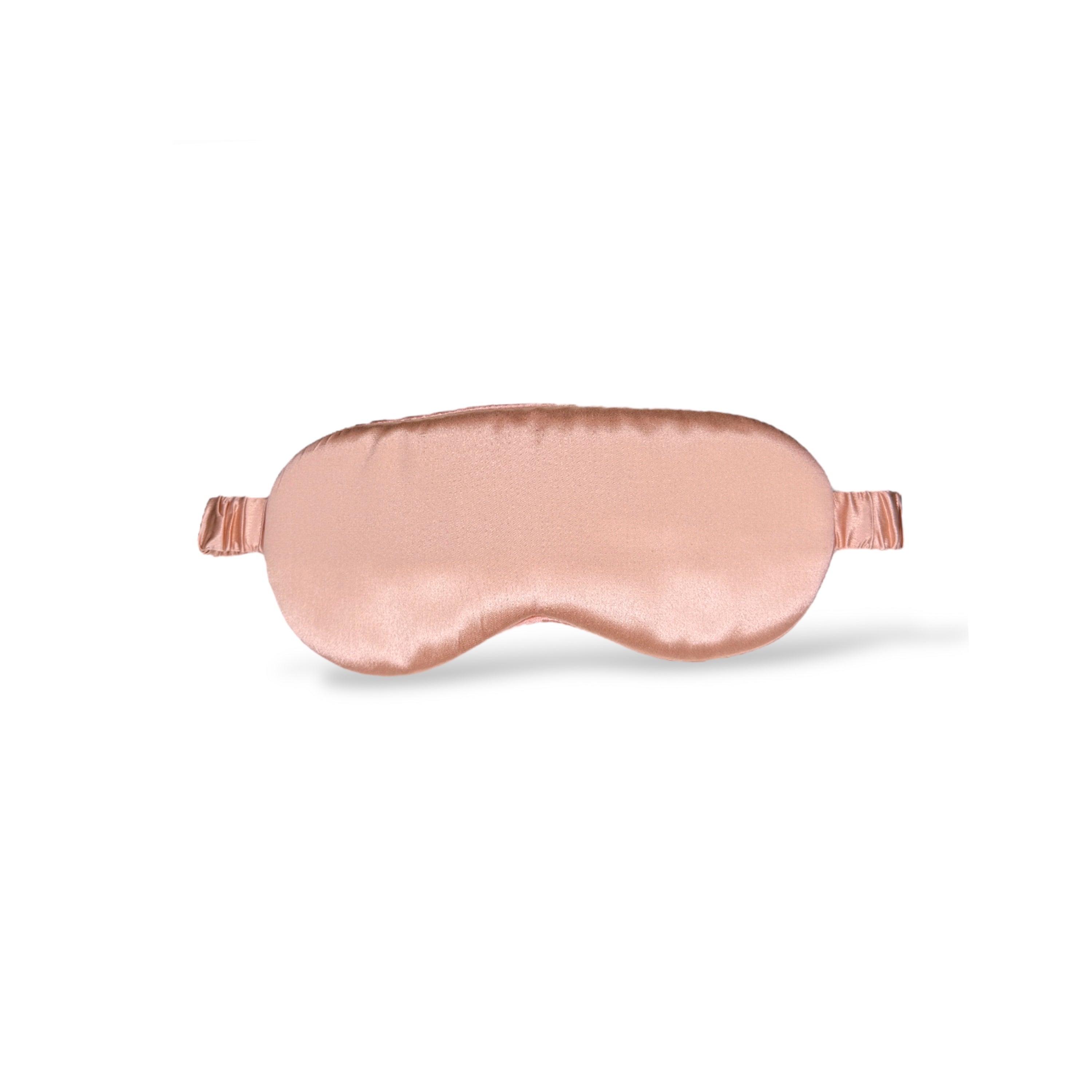 Black silk sleep mask with rose gold accents, blackout design, 22 Momme for luxurious comfort by Soreia.