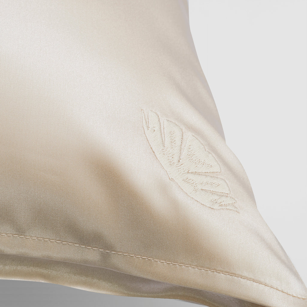 Elegant embroidered mulberry silk pillowcase by Soreia, 22 Momme charmeuse with intricate embroidery, soft and luxurious for sleep.
