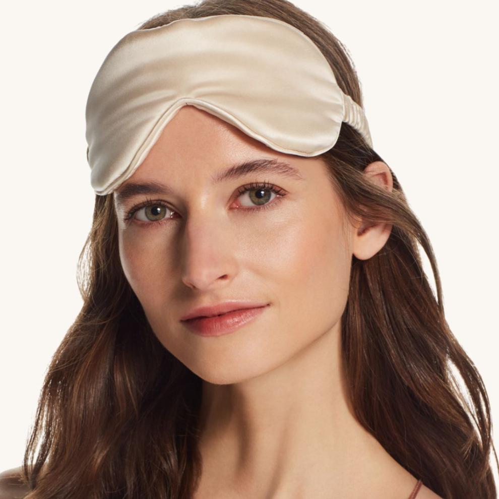 Luxurious champagne-colored Perle Silk Charmeuse Silk Sleep Mask with soft Mulberry silk for restful sleep and eye comfort.