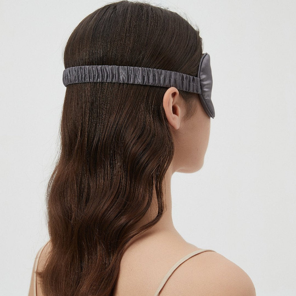 Luxurious Perle Silk Charmeuse Silk Sleep Mask with elastic band, soft and comfortable for restful sleep.