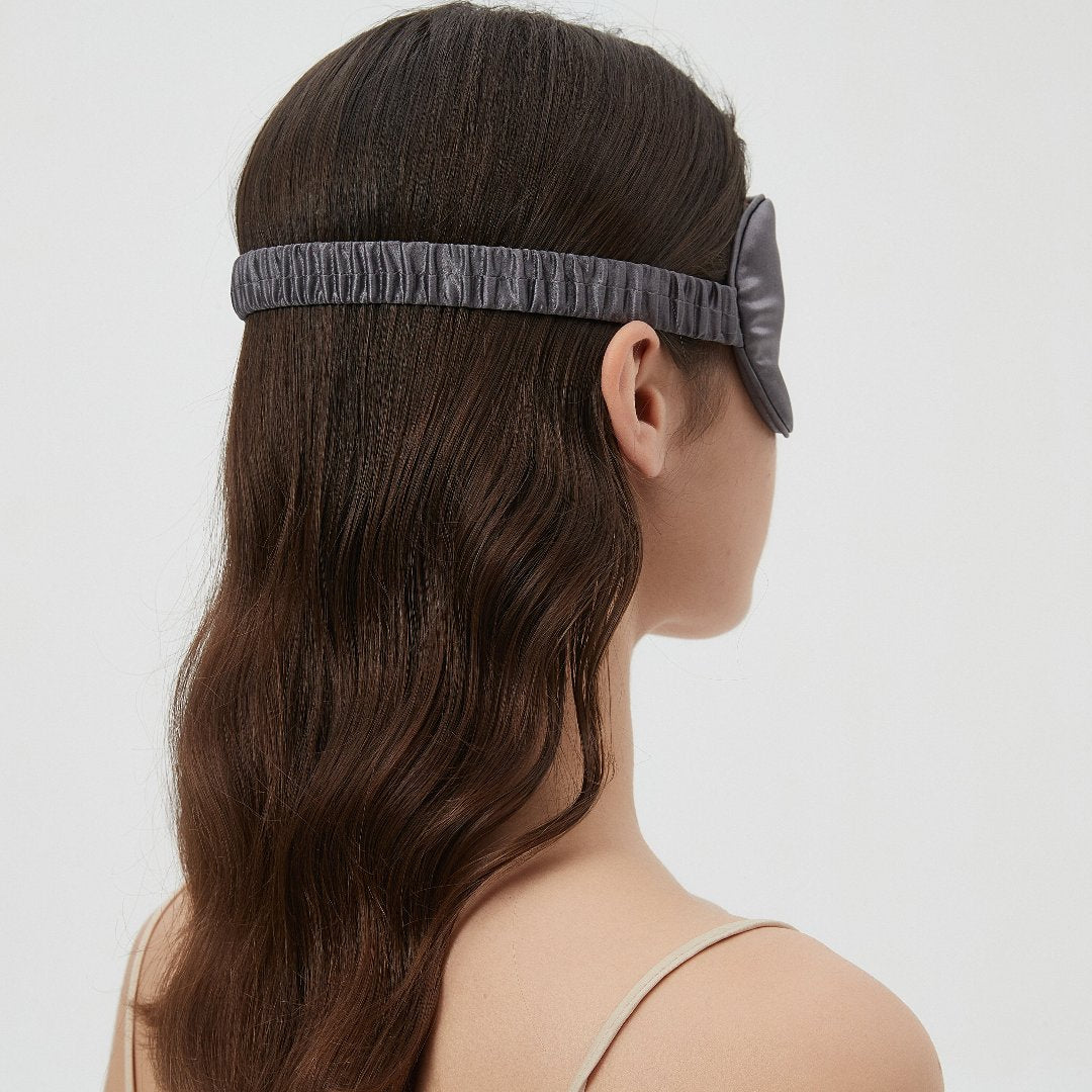 Luxurious Perle Silk Charmeuse Silk Sleep Mask with elastic band, soft and comfortable for restful sleep.