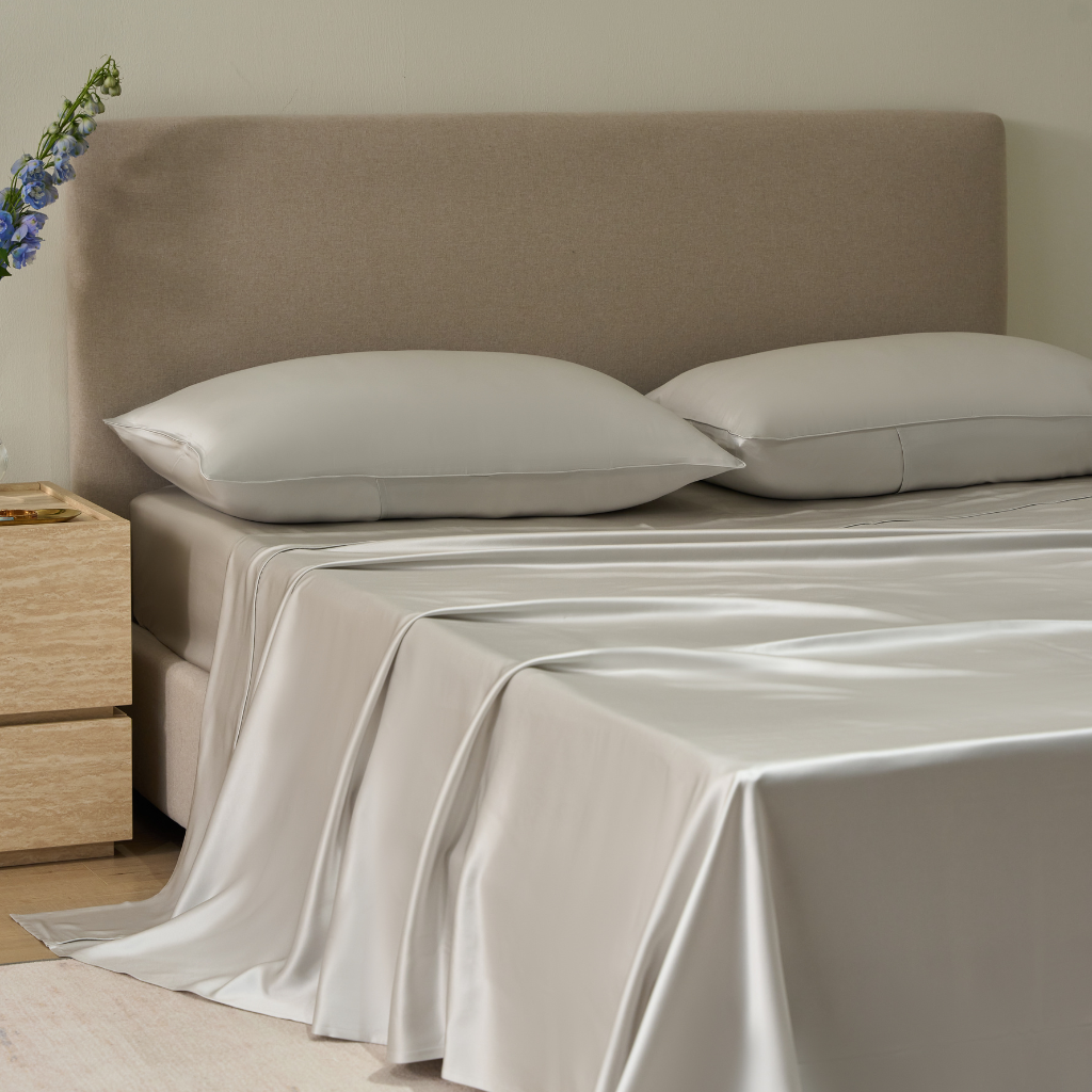 Soreia Charmeuse silk flat sheet in 22 Momme, made of luxurious mulberry silk, showcasing smooth, shiny fabric.