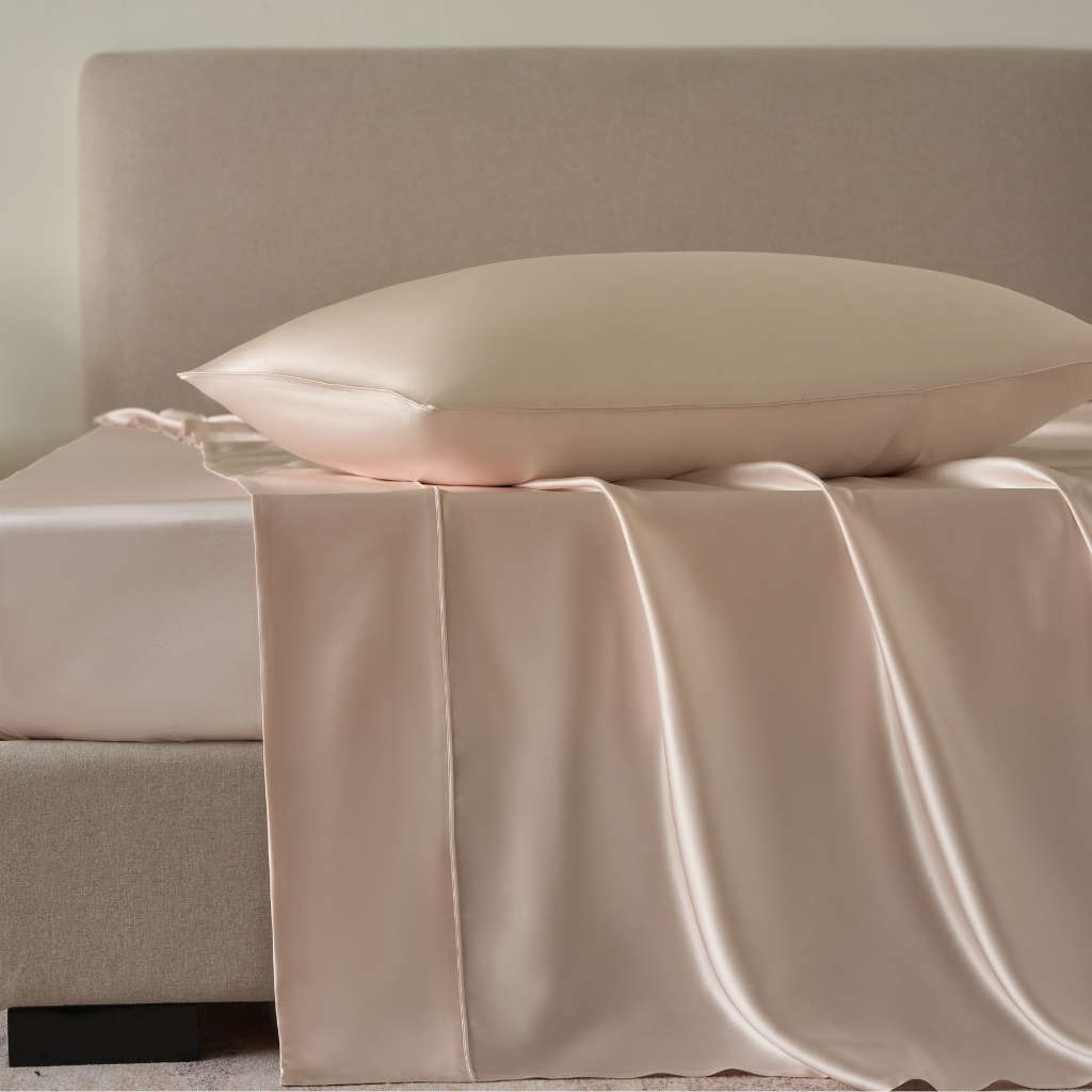 Soft mulberry silk flat sheet from Soreia, machine washable, 22 Momme, featuring a smooth, shiny charmeuse silk finish.