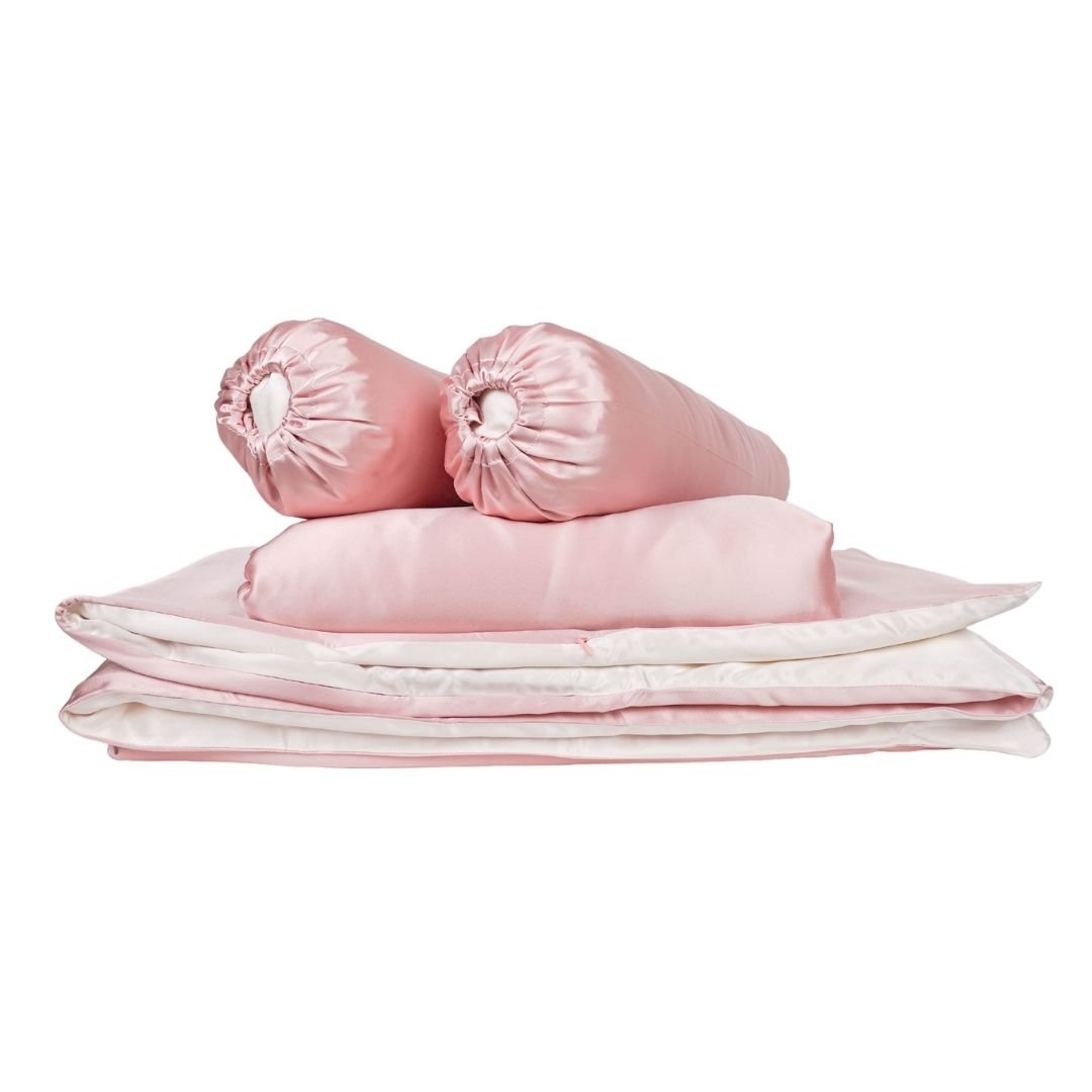Soft pink silk baby gift set from Soreia, featuring a bundle of joy with luxurious baby pink silk accessories.