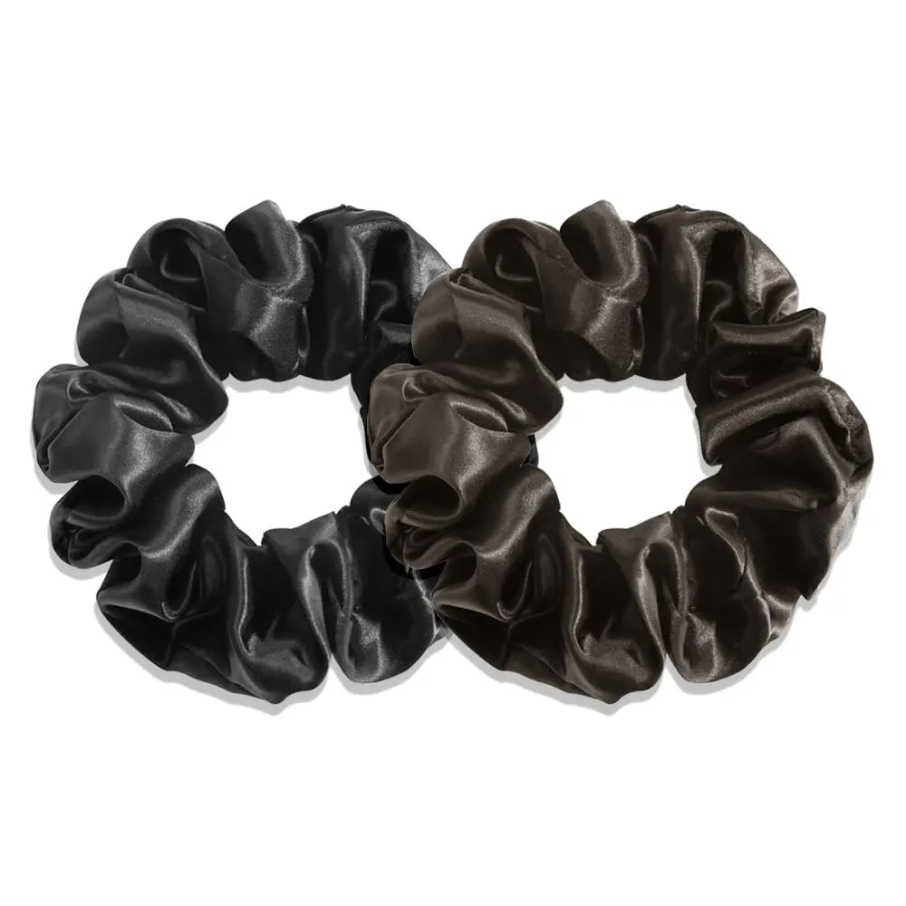 Soreia silk sleep set with champagne-white pillowcase, sleep mask, bonnet, and scrunchies for a luxurious beauty sleep experience.